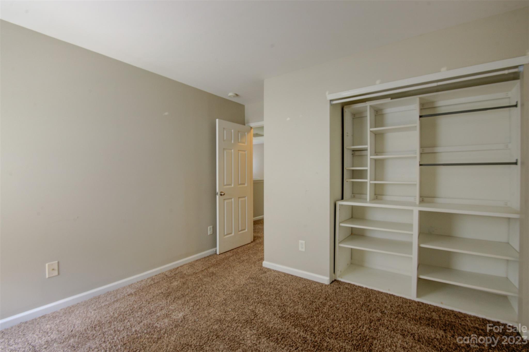 9201 Seamill Road Charlotte, NC 28278 - Photo 13 of 23 a view of an empty room and closet area