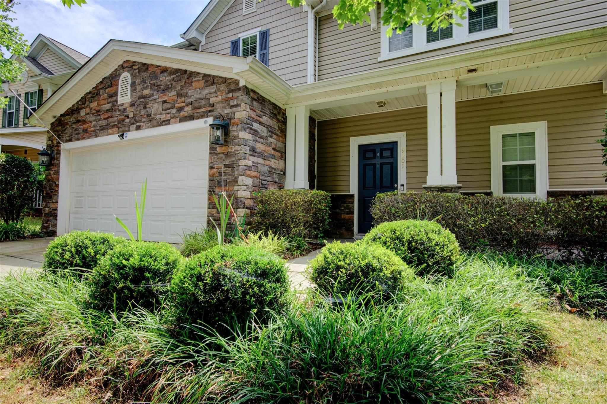 9201 Seamill Road Charlotte, NC 28278 - Photo 22 of 23 front view of a house with a yard