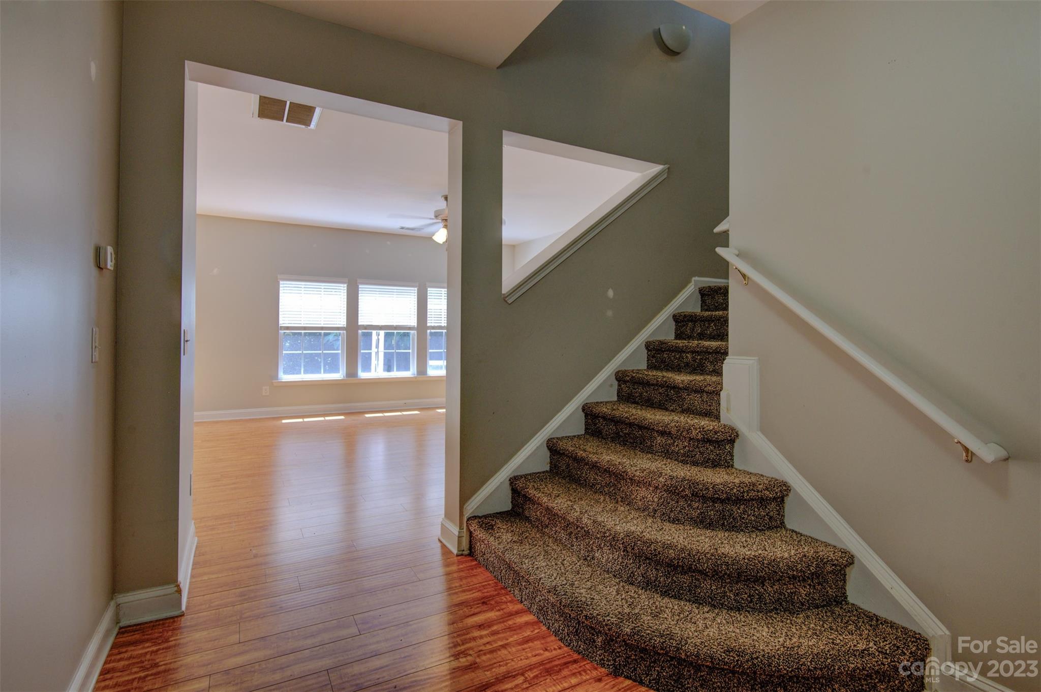 9201 Seamill Road Charlotte, NC 28278 - Photo 8 of 23 a view of entryway and hall with wooden floor