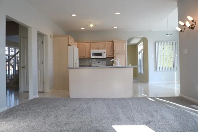 a view of a kitchen with a sink