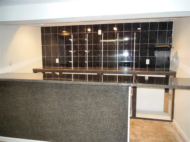 wooden floor in front of building