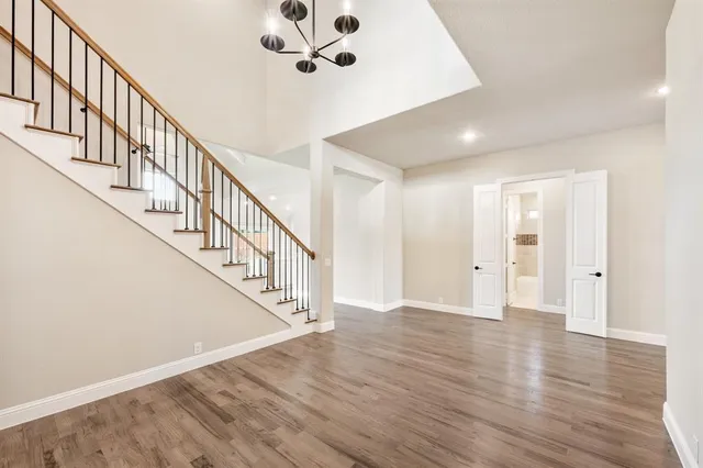 a view of an entryway with wooden floor
