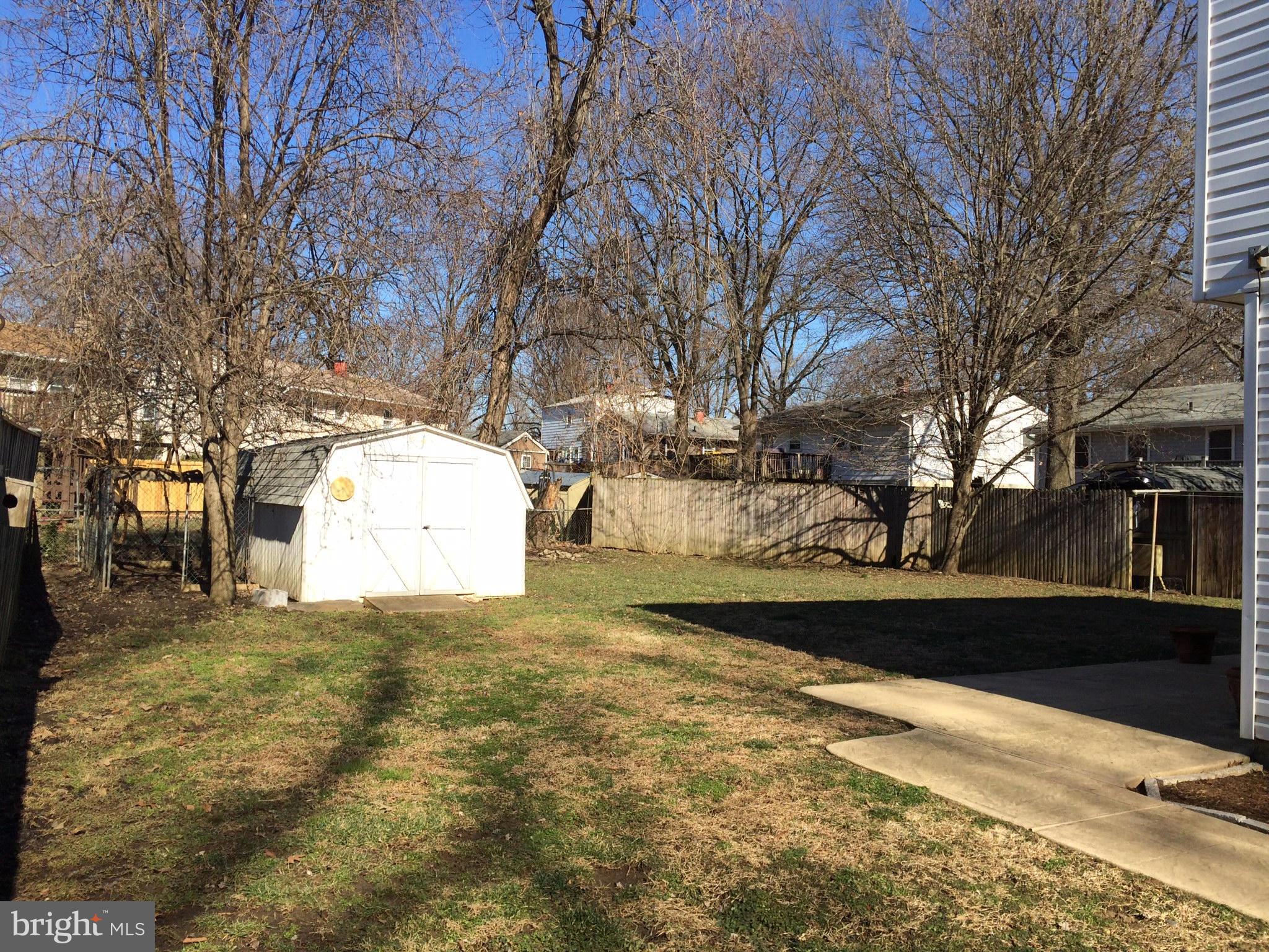 1916 Potomac Road Edgewater, MD 21037 - Photo 3 of 13 a view of yard with tree in the background