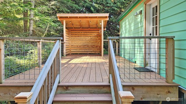 a view of balcony with a flat screen tv