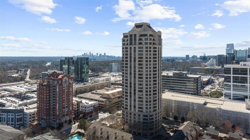 3475 Oak Valley Road Northeast, Unit 410 Atlanta, GA 30326 - Photo 32 of 36 a view of a city with tall buildings