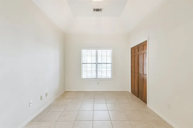 an empty room with windows