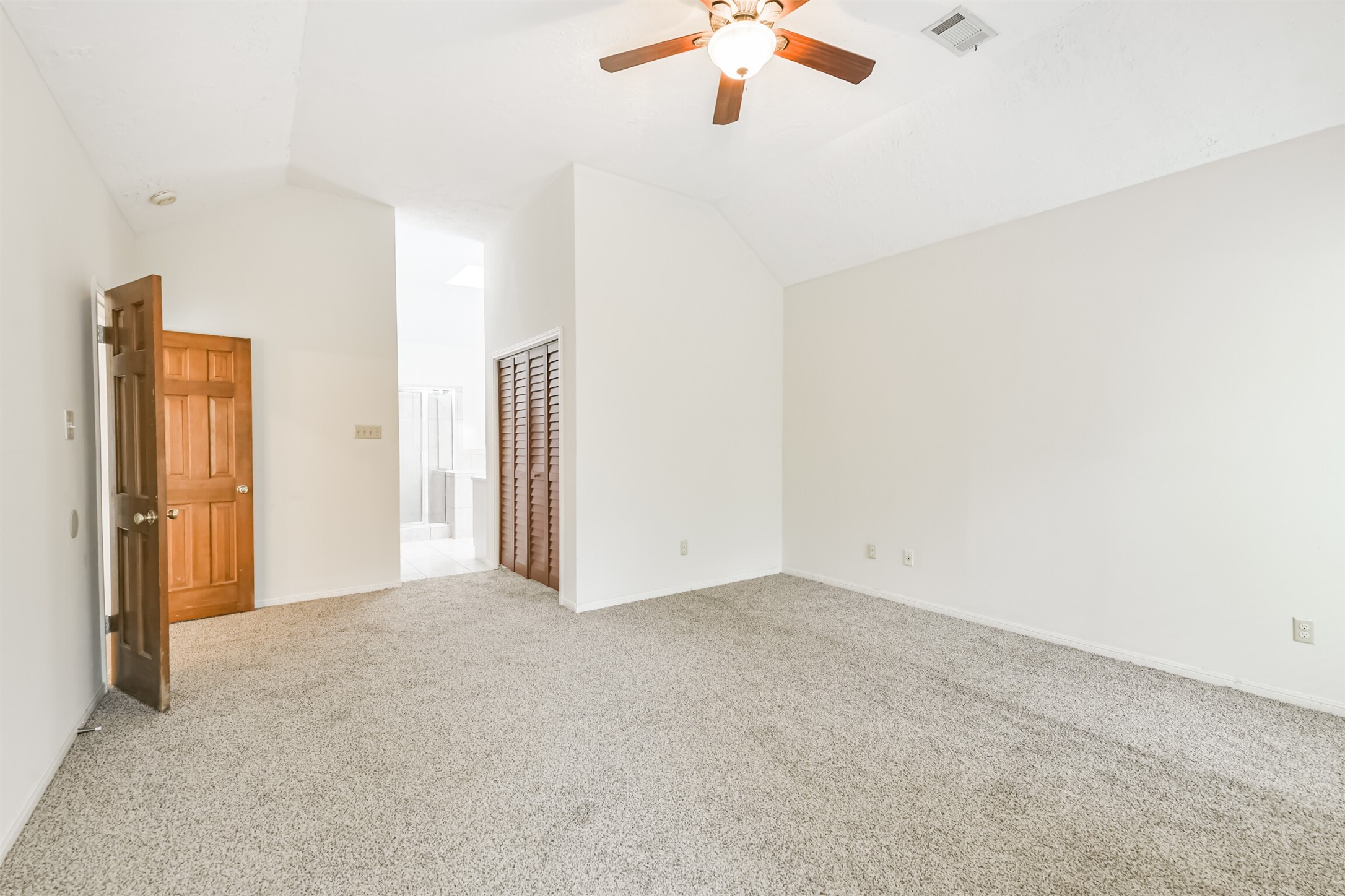 13626 Cedar Point Drive Cypress, TX 77429 - Photo 17 of 34 an empty room with a chandelier fan
