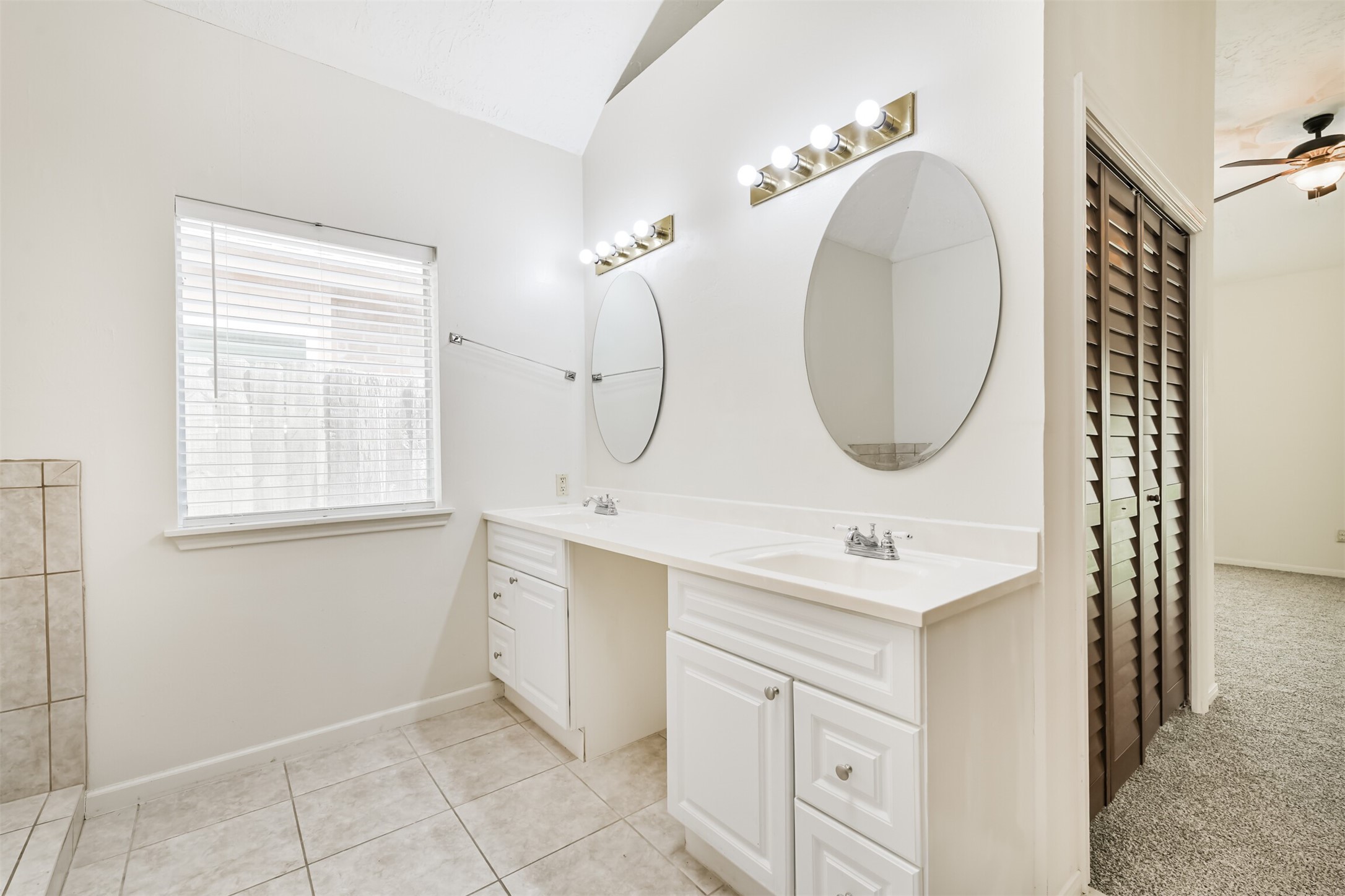 13626 Cedar Point Drive Cypress, TX 77429 - Photo 19 of 34 a bathroom with a sink and a mirror