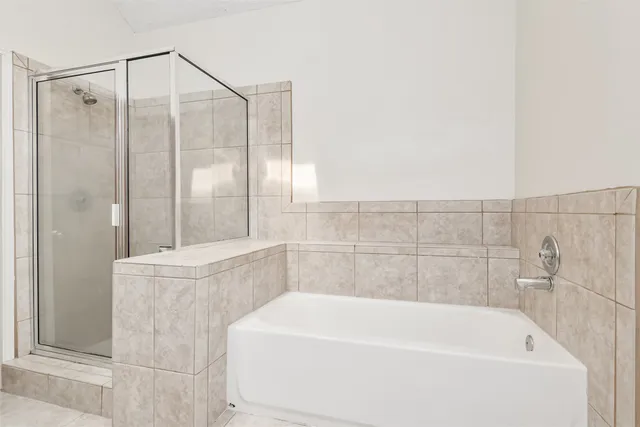 a bathroom with a white bath tub