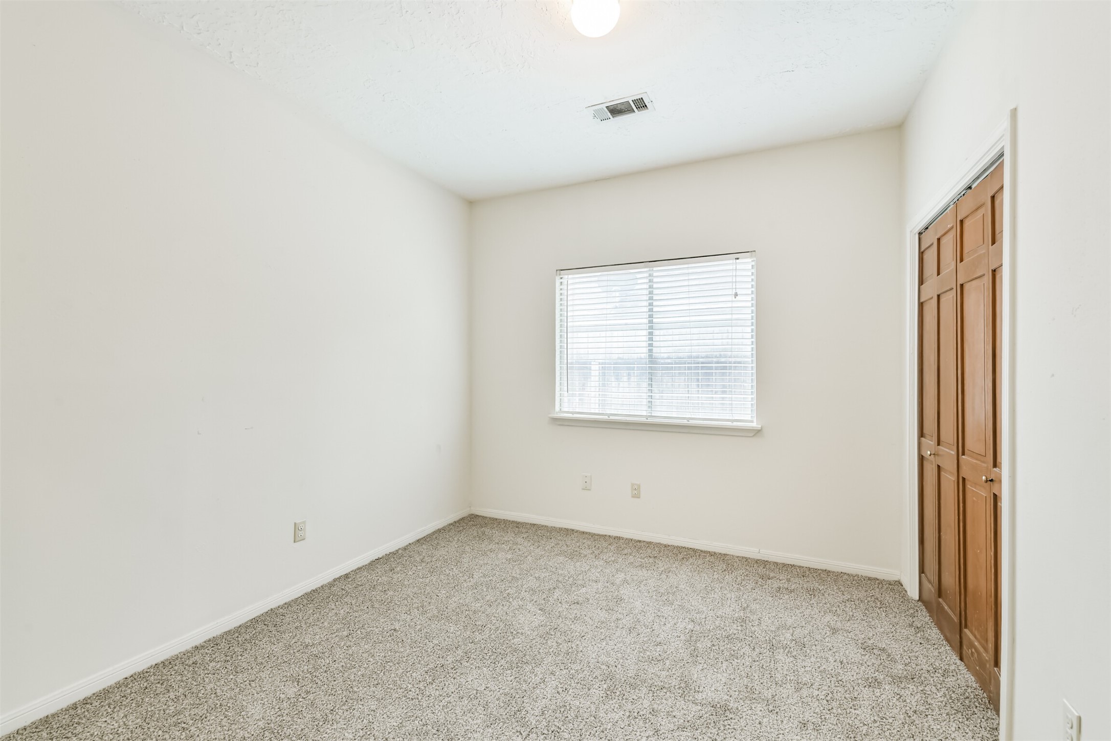 13626 Cedar Point Drive Cypress, TX 77429 - Photo 23 of 34 an empty room with windows