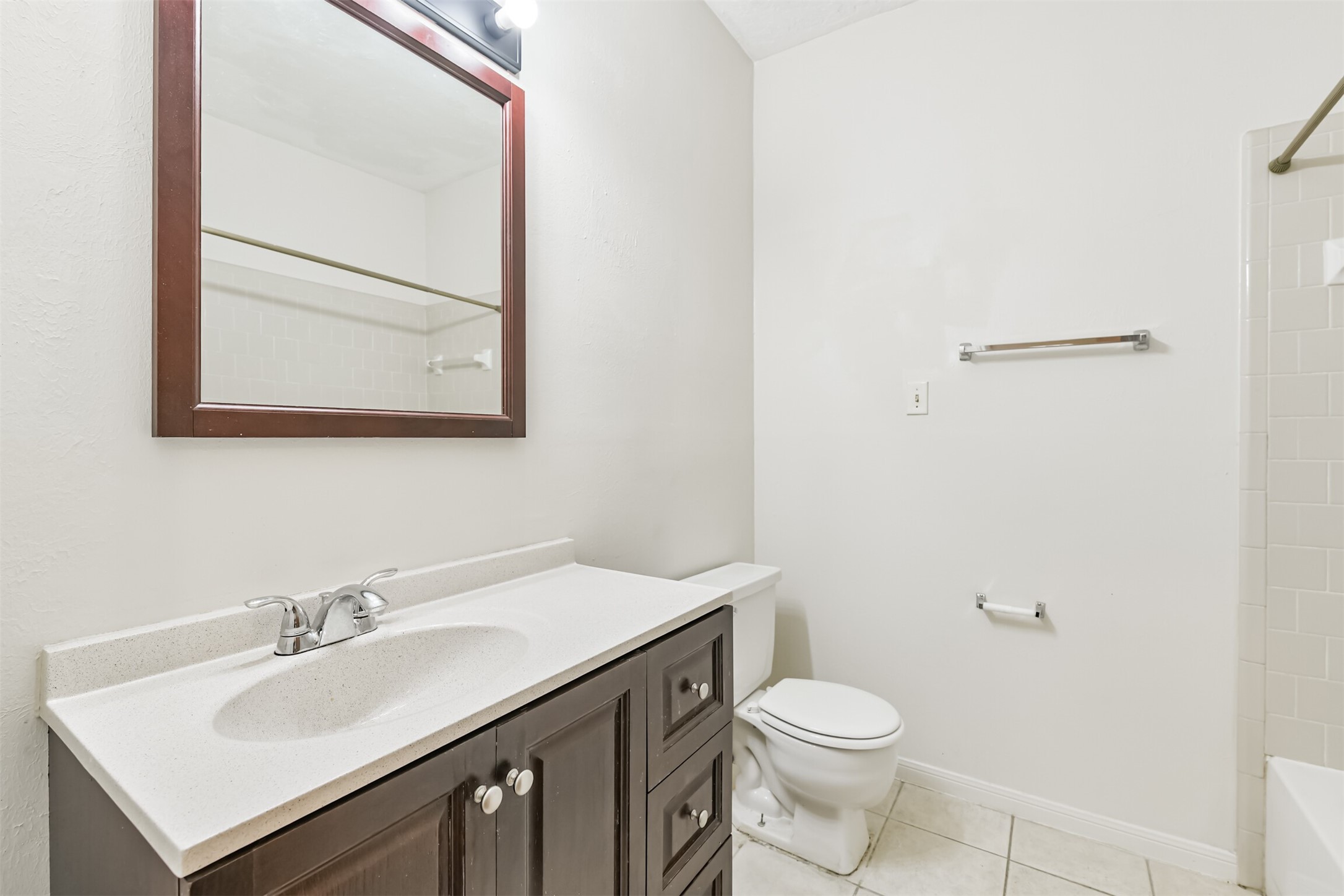 13626 Cedar Point Drive Cypress, TX 77429 - Photo 25 of 34 a bathroom with a sink a toilet and mirror