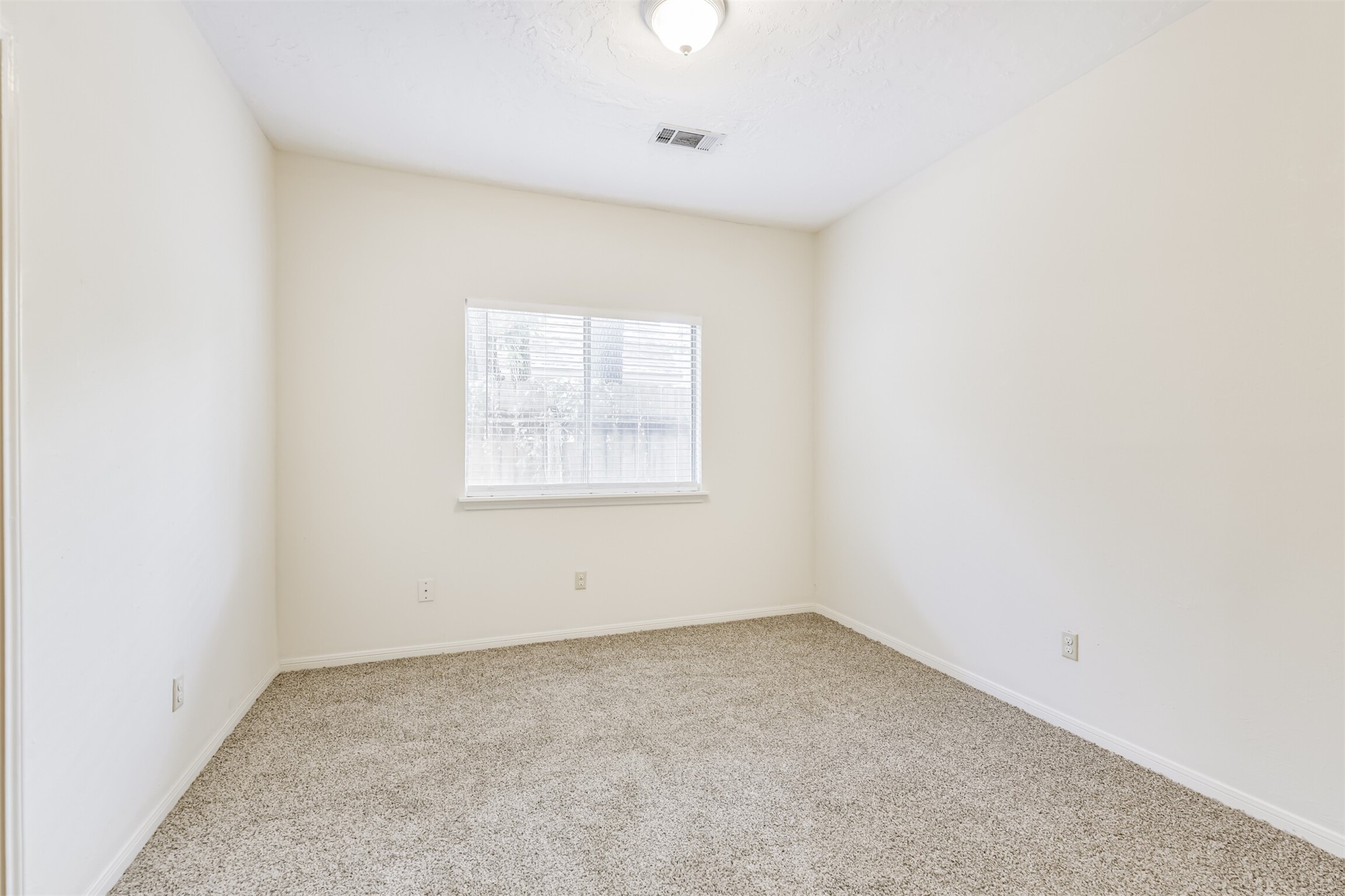 13626 Cedar Point Drive Cypress, TX 77429 - Photo 27 of 34 an empty room with a window