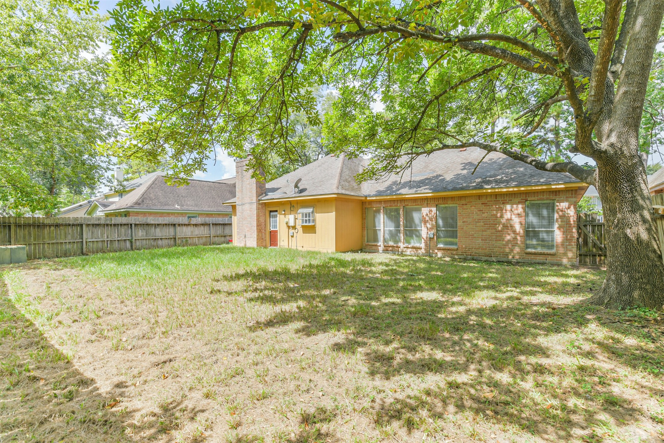 13626 Cedar Point Drive Cypress, TX 77429 - Photo 30 of 34 a front view of a house with a garden