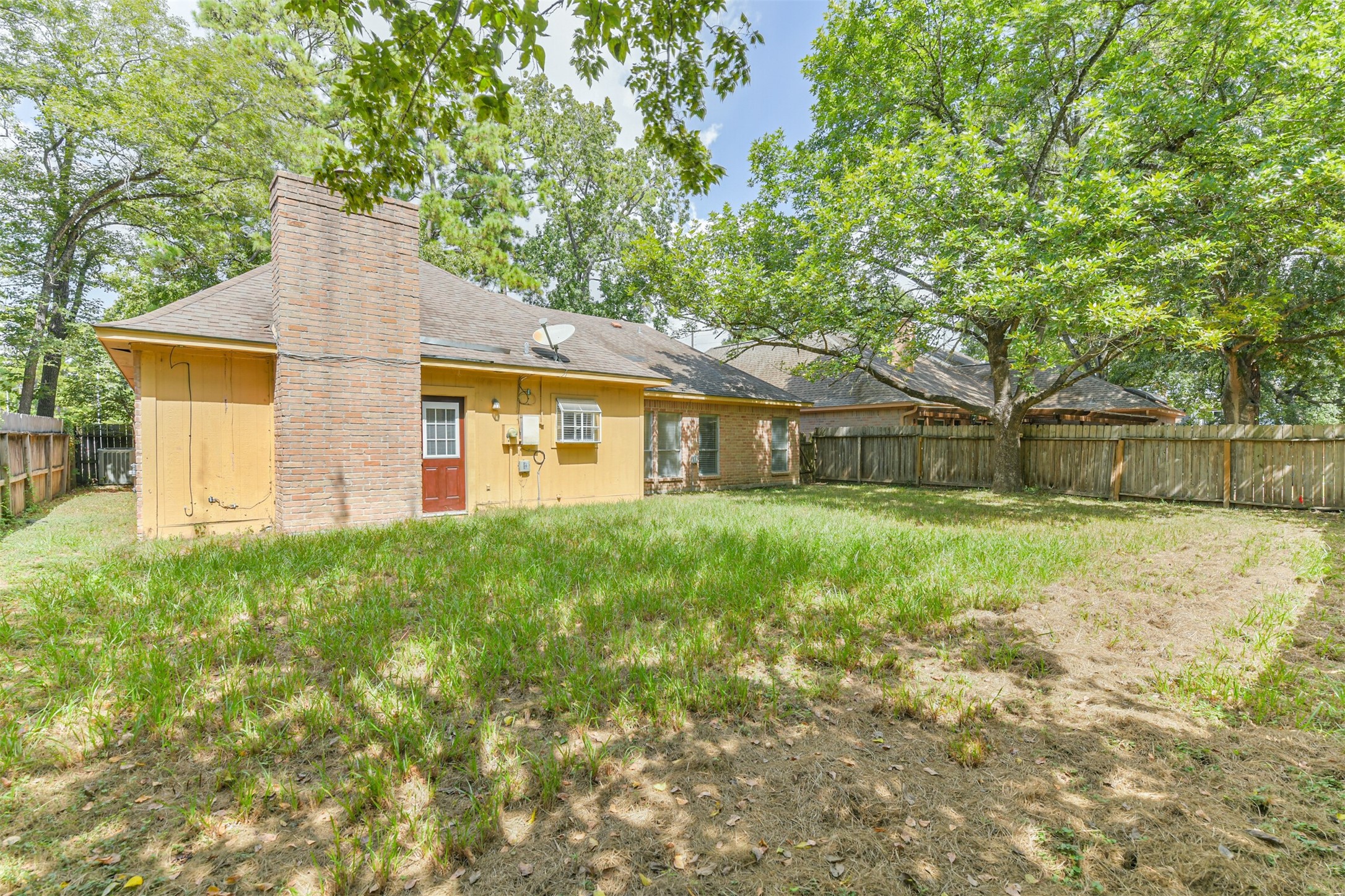 13626 Cedar Point Drive Cypress, TX 77429 - Photo 31 of 34 a view of a house with yard and a garden