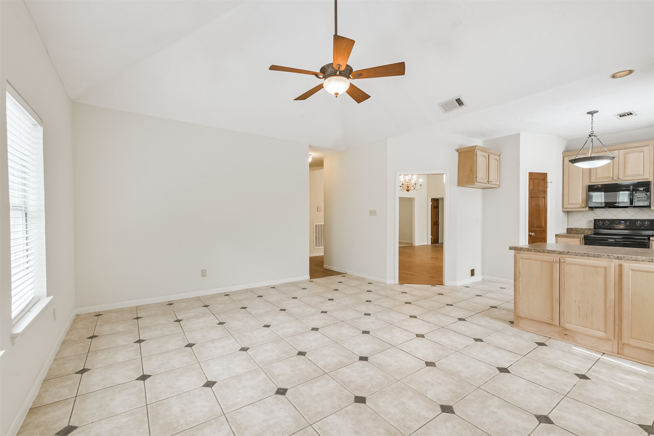 13626 Cedar Point Drive Cypress, TX 77429 - Photo 9 of 34 a view of a kitchen with a stove
