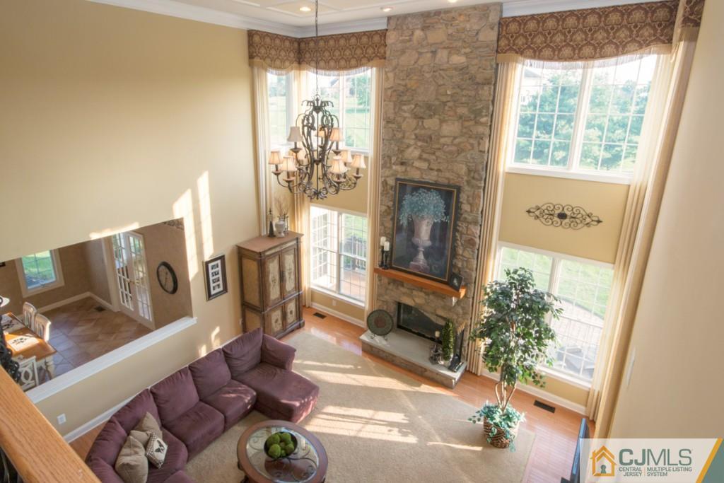 1 Baker Way Pennington, NJ 08534 - Photo 13 of 25 a living room with furniture and a fireplace