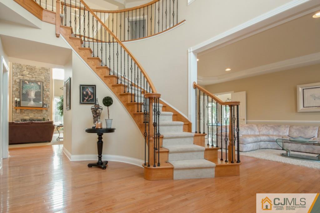 1 Baker Way Pennington, NJ 08534 - Photo 4 of 25 a view of entryway and hall with wooden floor