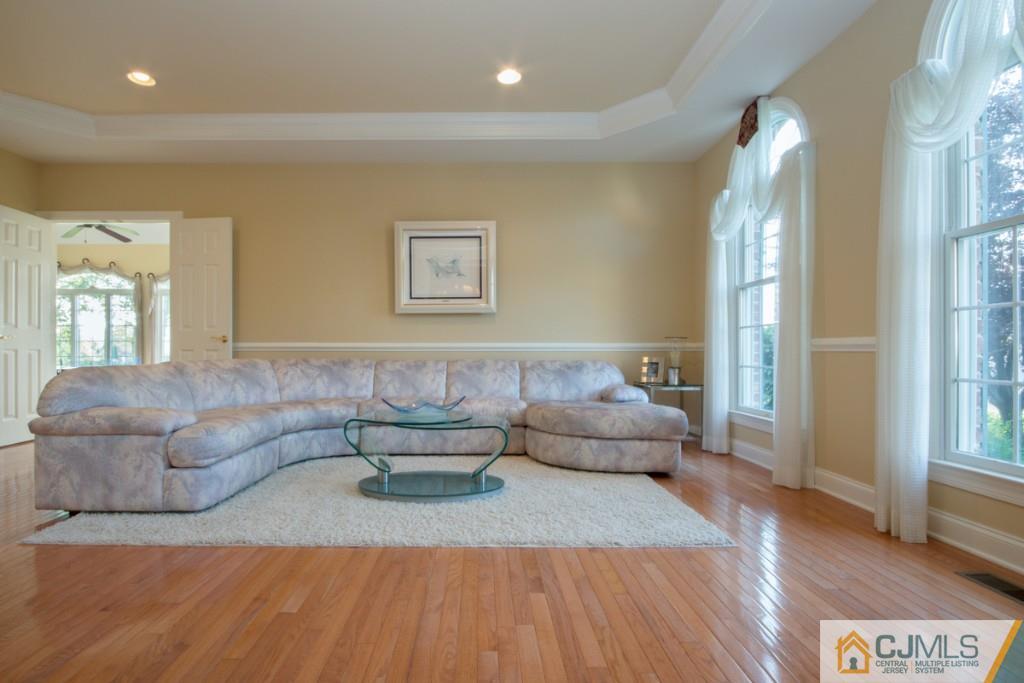 1 Baker Way Pennington, NJ 08534 - Photo 6 of 25 a living room with furniture and a large window