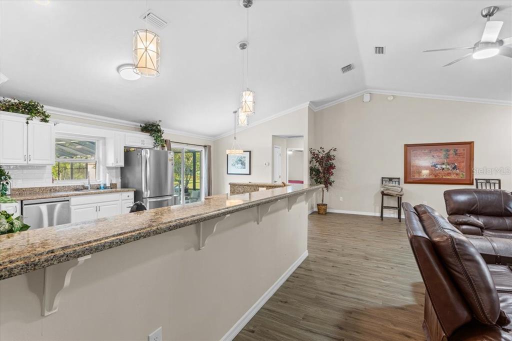 4700 Southwest Wilson Springs Road Fort White, FL 32038 - Photo 31 of 41 a large white kitchen with a large window