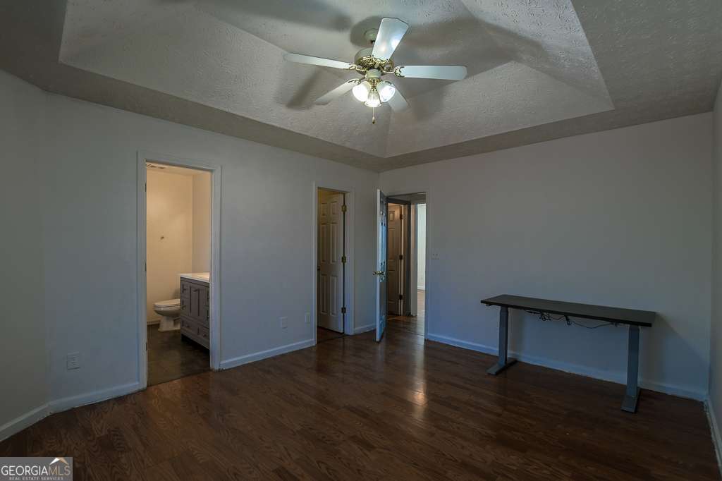 336 Shenandoah Circle Winder, GA 30680 - Photo 17 of 38 wooden floor in an empty room with a window