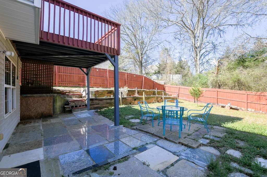 336 Shenandoah Circle Winder, GA 30680 - Photo 33 of 38 a view of a backyard with sitting area