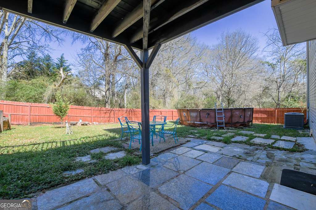 336 Shenandoah Circle Winder, GA 30680 - Photo 34 of 38 a view of backyard with plants and trees