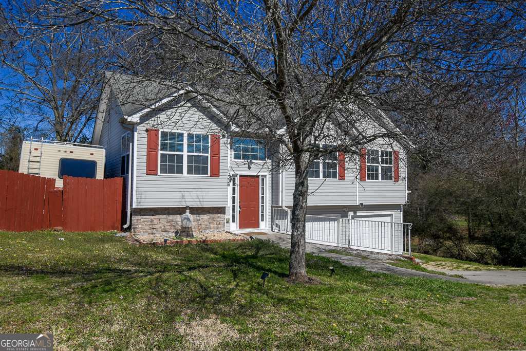 336 Shenandoah Circle Winder, GA 30680 - Photo 4 of 38 front view of a house with a yard