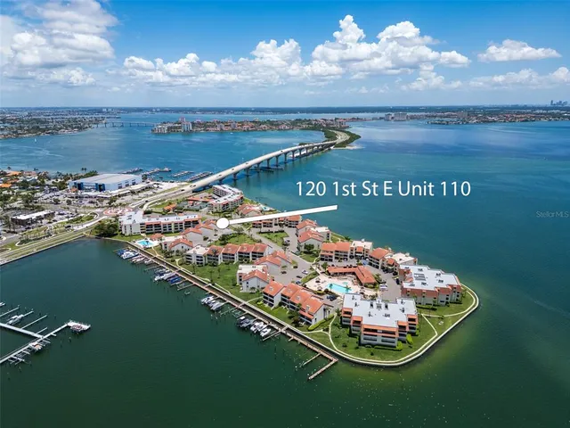 a view of a swimming pool with a lake view