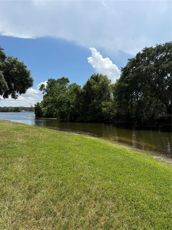 908 Lake Destiny Road, Unit B Altamonte Springs, FL 32714 - Photo 14 of 16 a view of a lake from a yard