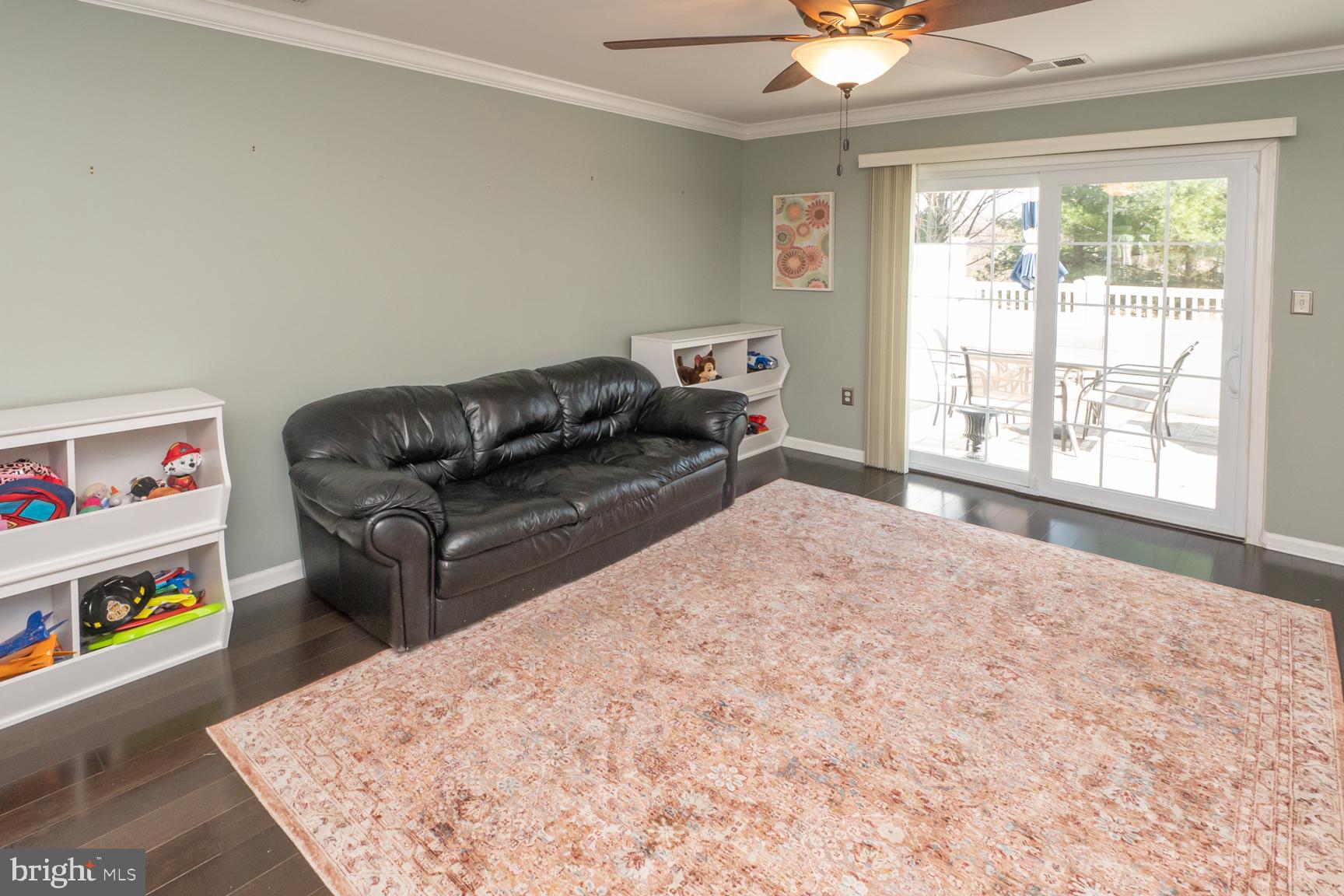 314 Watkins Road Pennington, NJ 08534 - Photo 28 of 57 Family room with sliders to paver patio