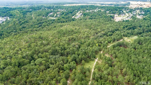 a view of a yard with an outdoor space
