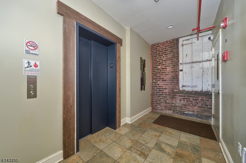 28 West Main Street, Unit 2D Somerville, NJ 08876 - Photo 7 of 13 a view of entryway with shower