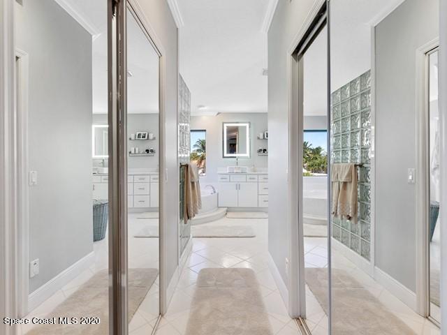 690 Fountain Boulevard Satellite Beach, FL 32937 - Photo 34 of 64 035_Master Closets to Bathroom