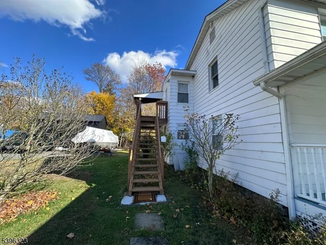 a view of backyard of house