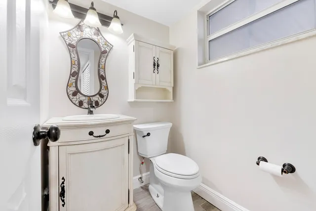 a bathroom with a shower and a toilet