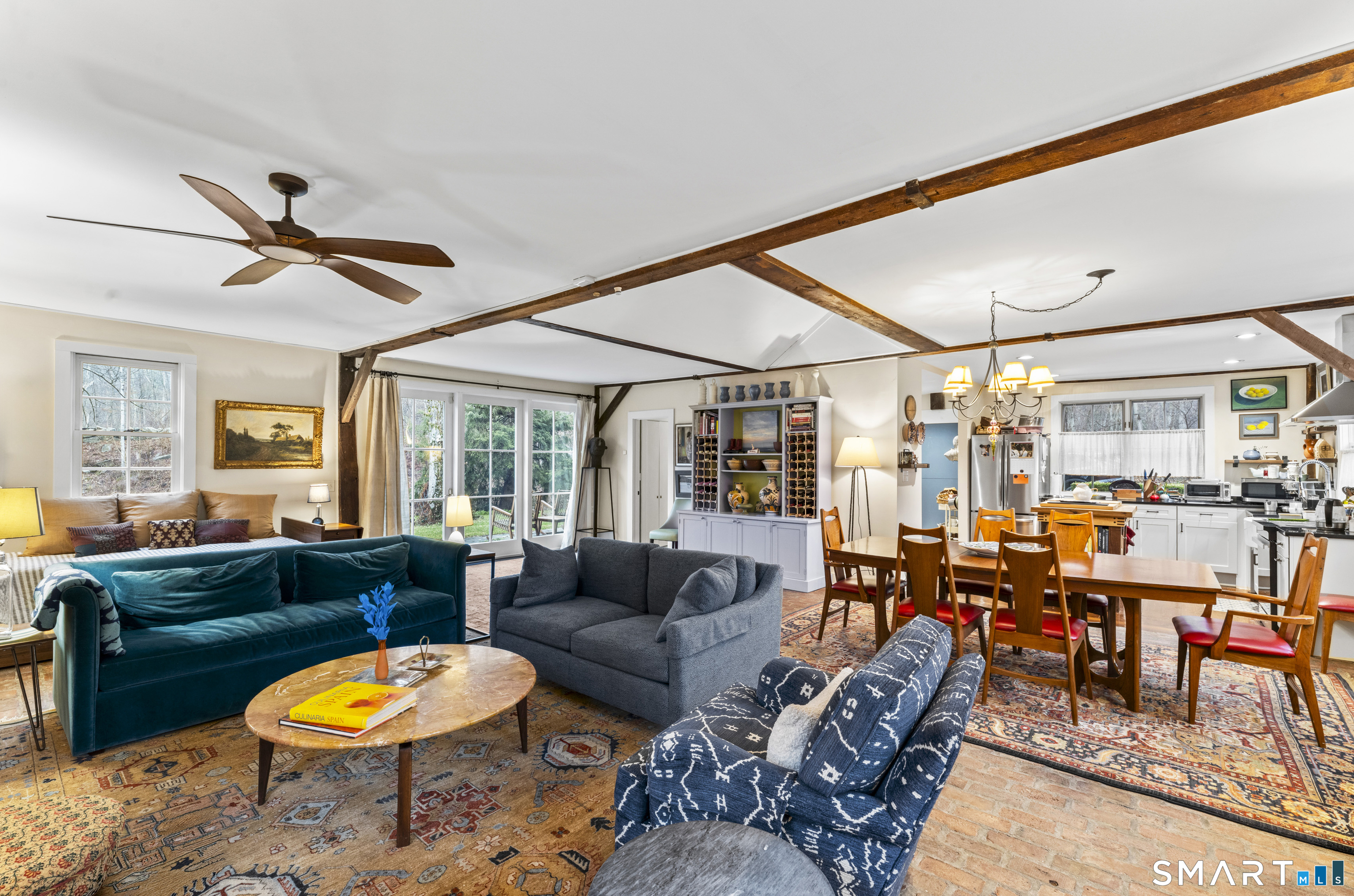 21 Old Mill Road New Milford, CT 06776 - Photo 10 of 43 Open living/dining/kitchen, with doors to the patio