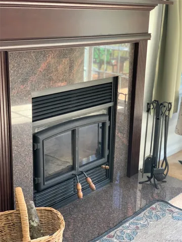 a bathroom with a sink toilet and mirror