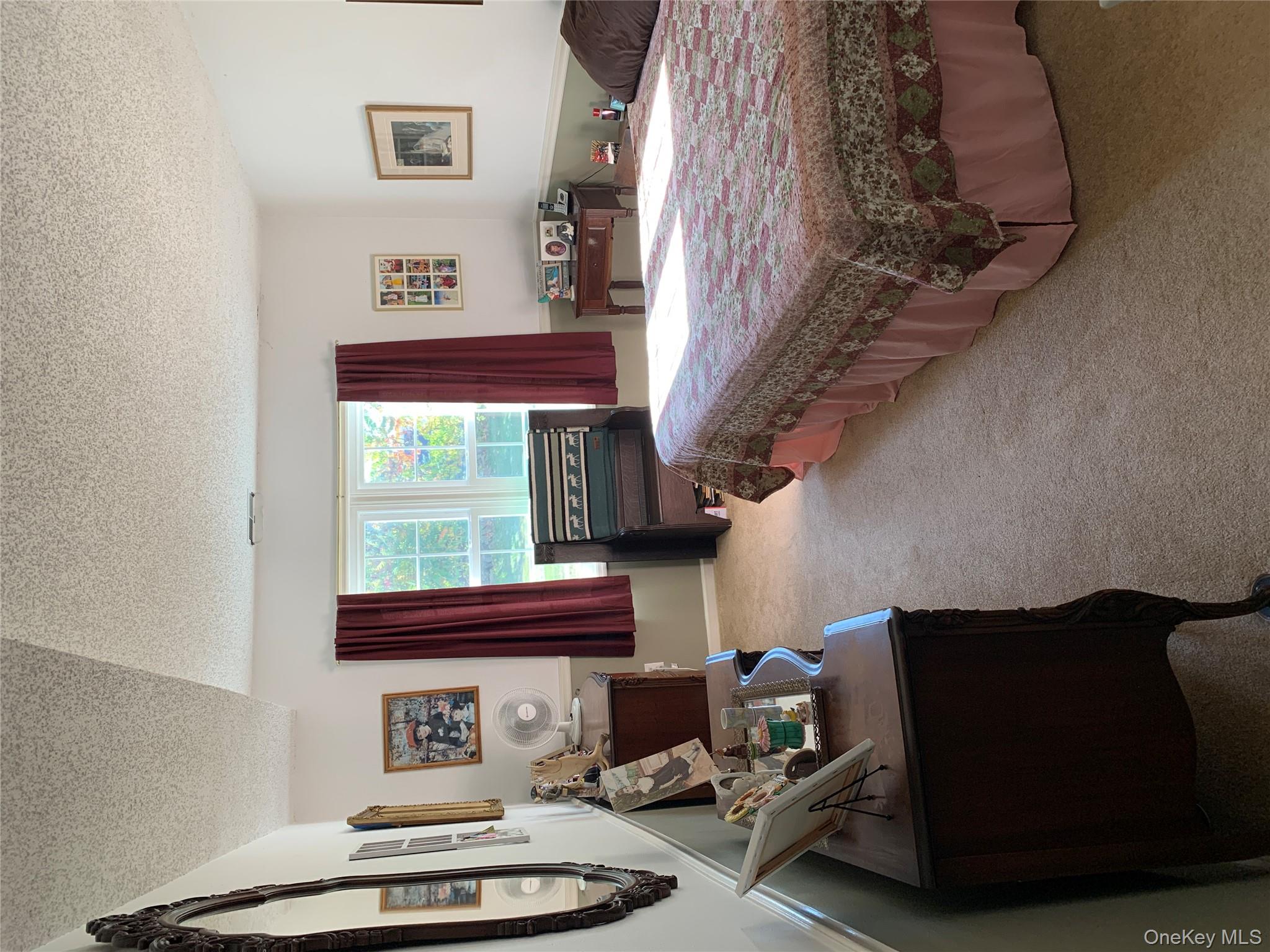 1 South Cambridge Court Fishkill, NY 12524 - Photo 17 of 49 a bedroom with a bed and a dresser