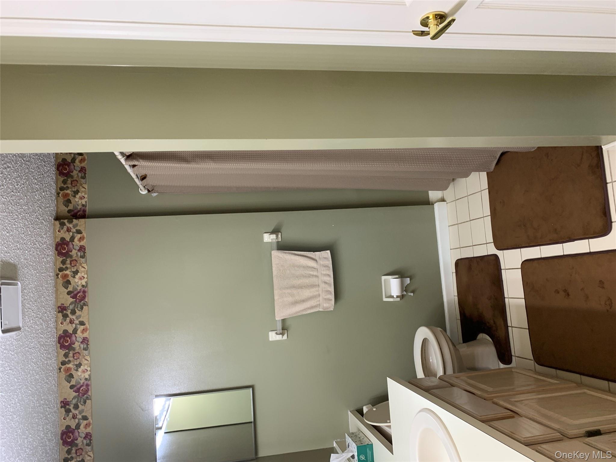 1 South Cambridge Court Fishkill, NY 12524 - Photo 19 of 49 a bathroom with a sink and a mirror