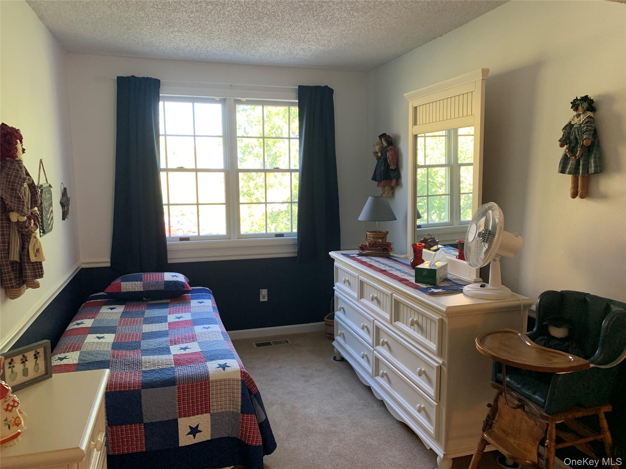 1 South Cambridge Court Fishkill, NY 12524 - Photo 22 of 49 a bedroom with a bed and a window