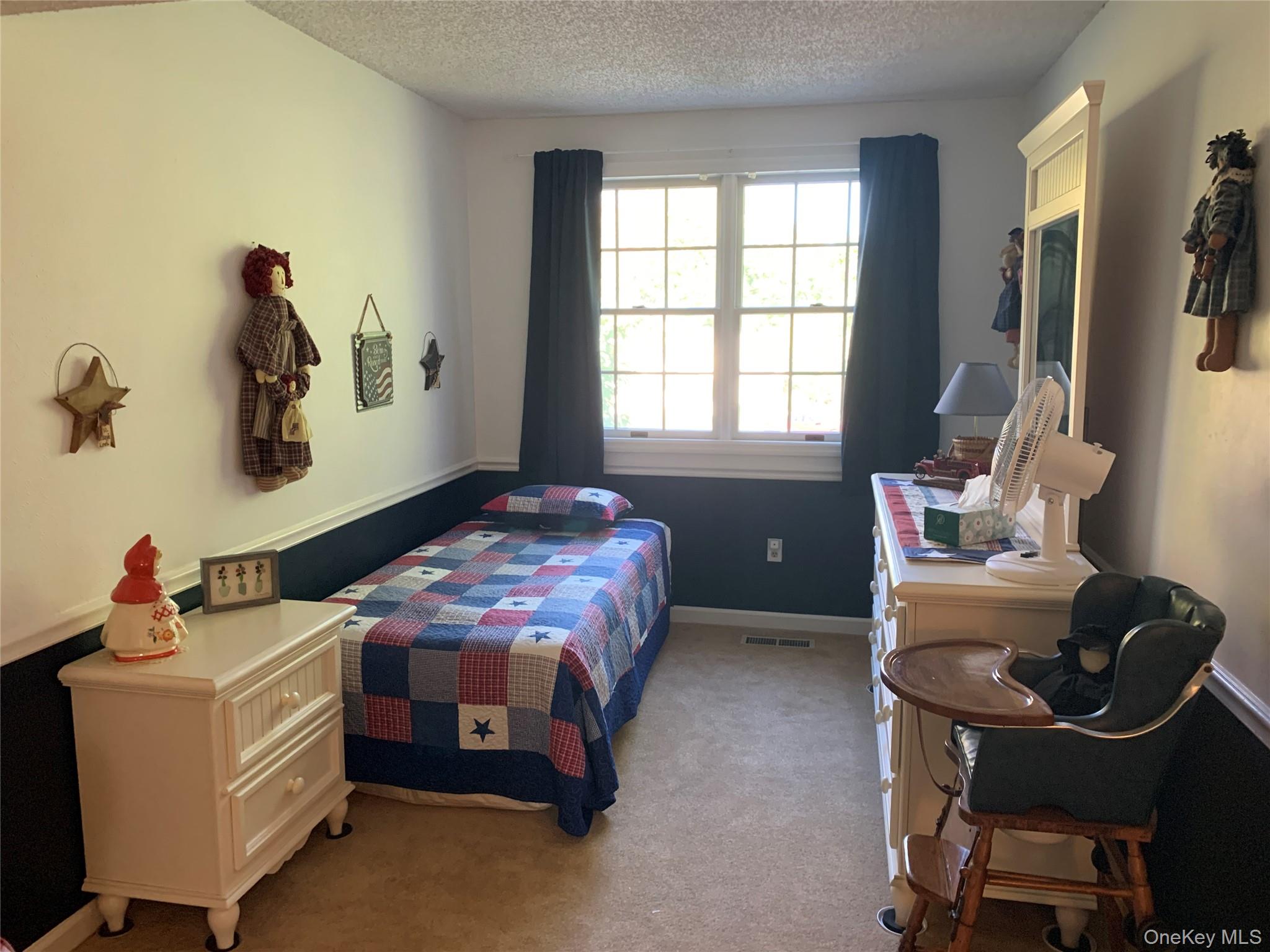 1 South Cambridge Court Fishkill, NY 12524 - Photo 25 of 49 a bedroom with a bed and a window