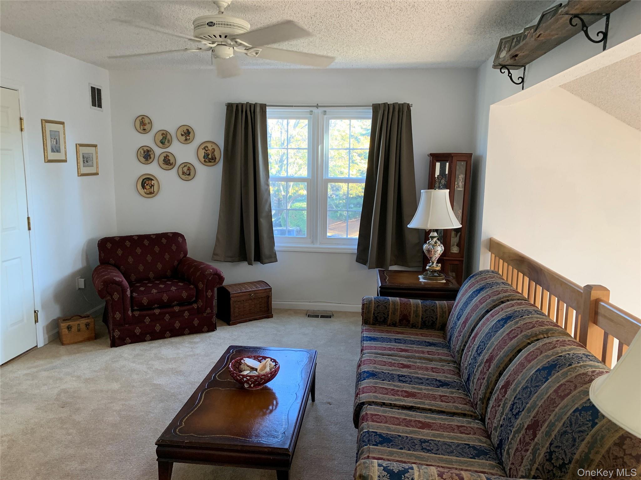 1 South Cambridge Court Fishkill, NY 12524 - Photo 28 of 49 a living room with furniture and a window