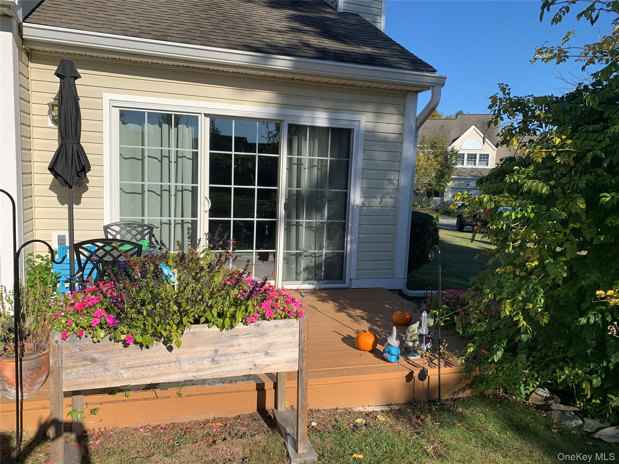 1 South Cambridge Court Fishkill, NY 12524 - Photo 36 of 49 front view of a house with a potted plant