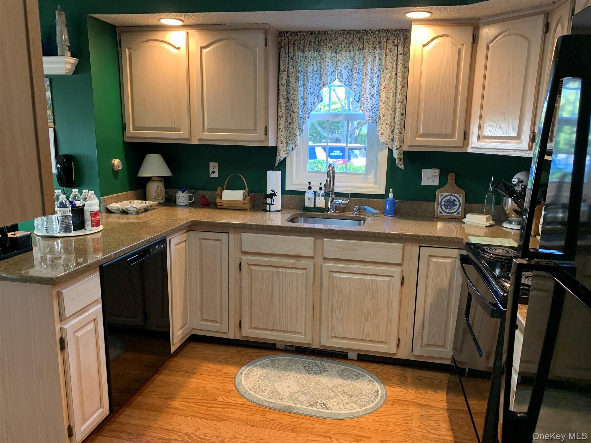 1 South Cambridge Court Fishkill, NY 12524 - Photo 6 of 49 a kitchen with a sink a stove and cabinets