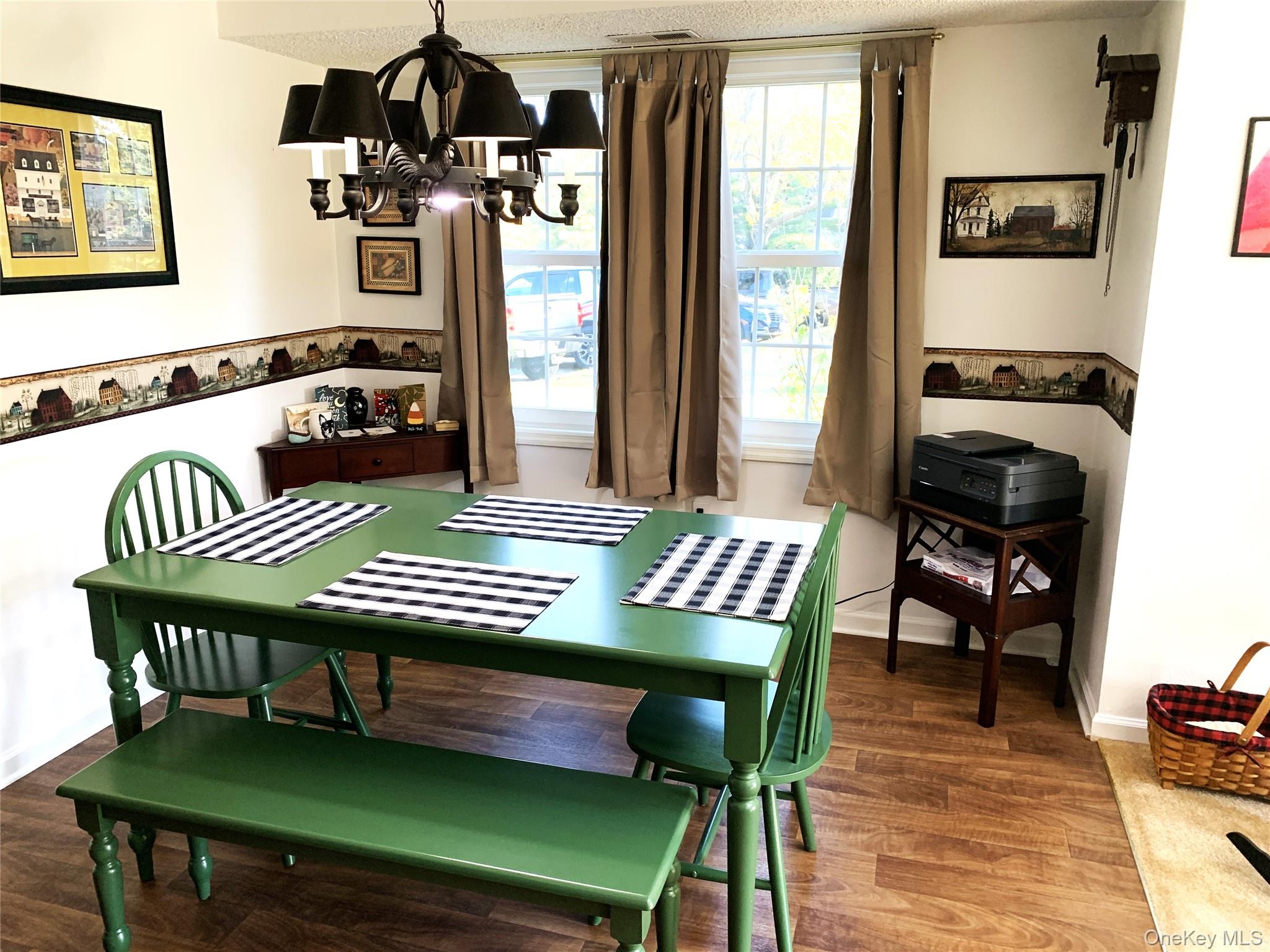 1 South Cambridge Court Fishkill, NY 12524 - Photo 9 of 49 a view of a dining room with furniture window and wooden floor