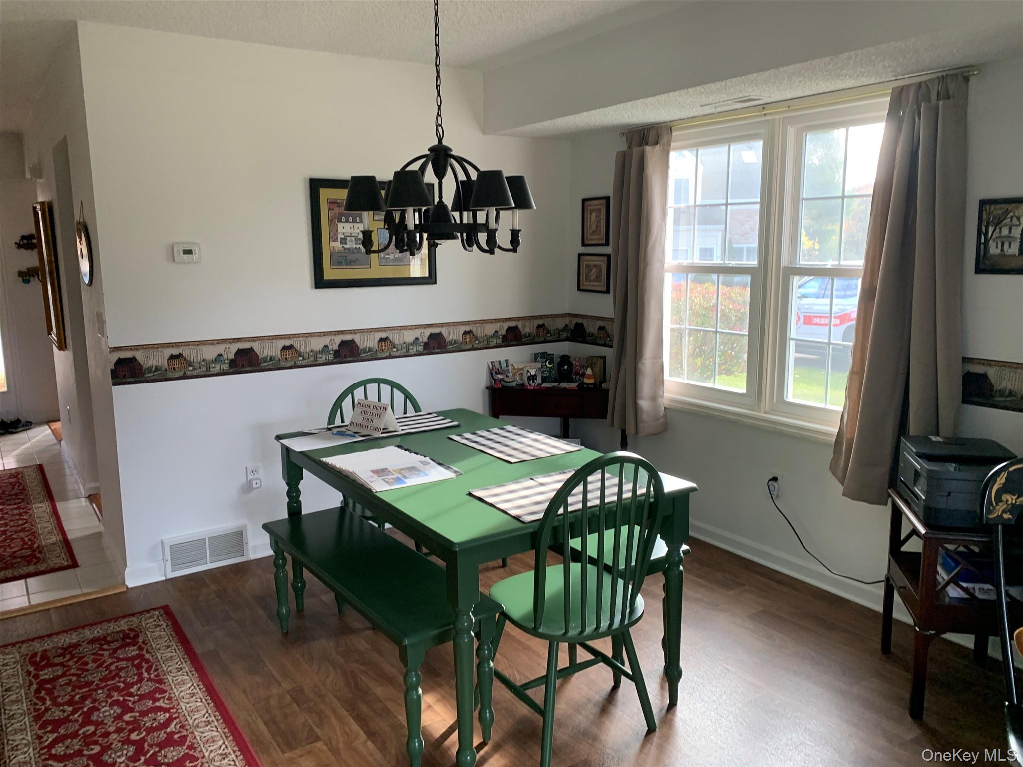 1 South Cambridge Court Fishkill, NY 12524 - Photo 10 of 49 a view of a dining room with furniture window and wooden floor