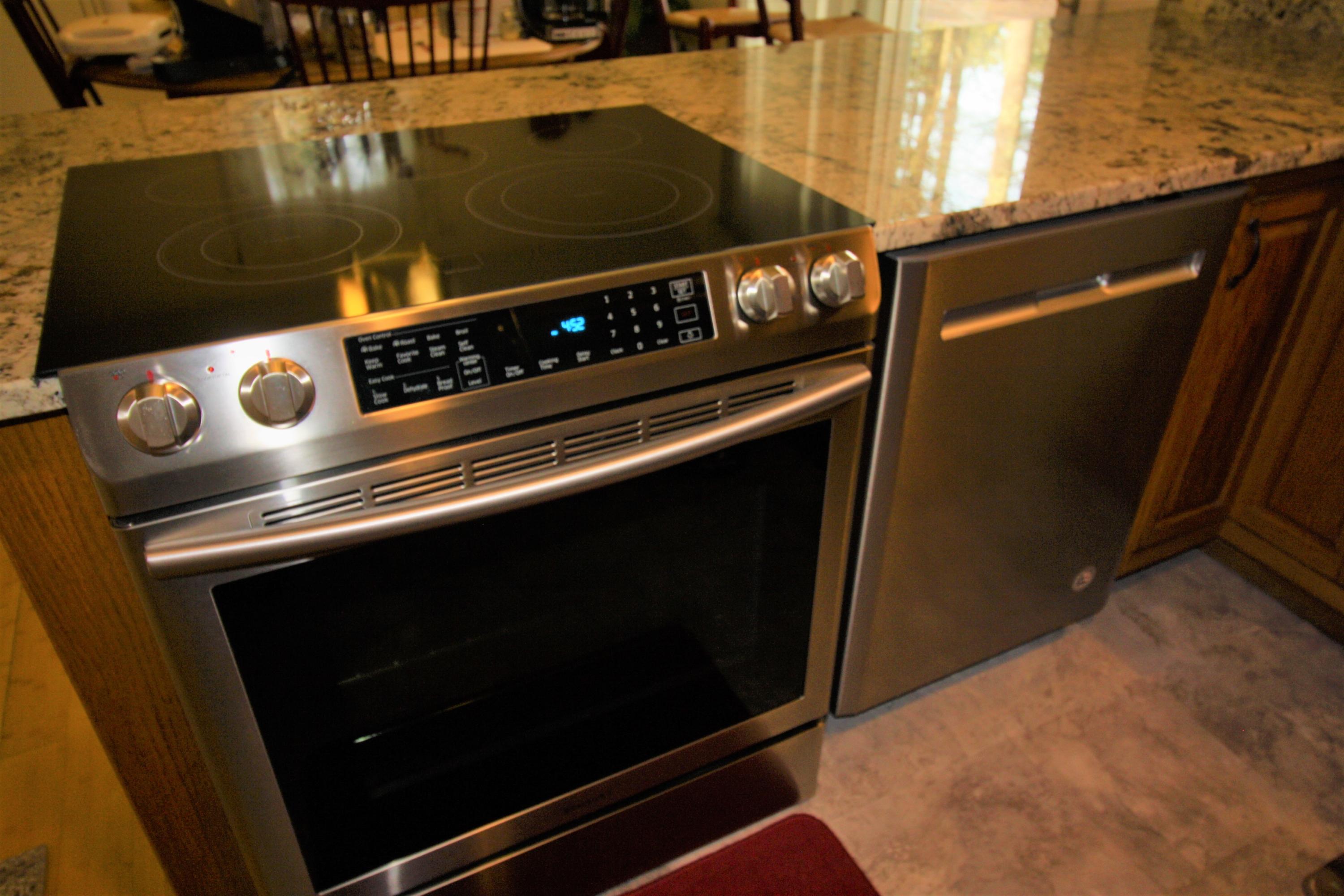 206 Nye Road Centerville, MA 02632 - Photo 3 of 14 a close view of stove and microwave