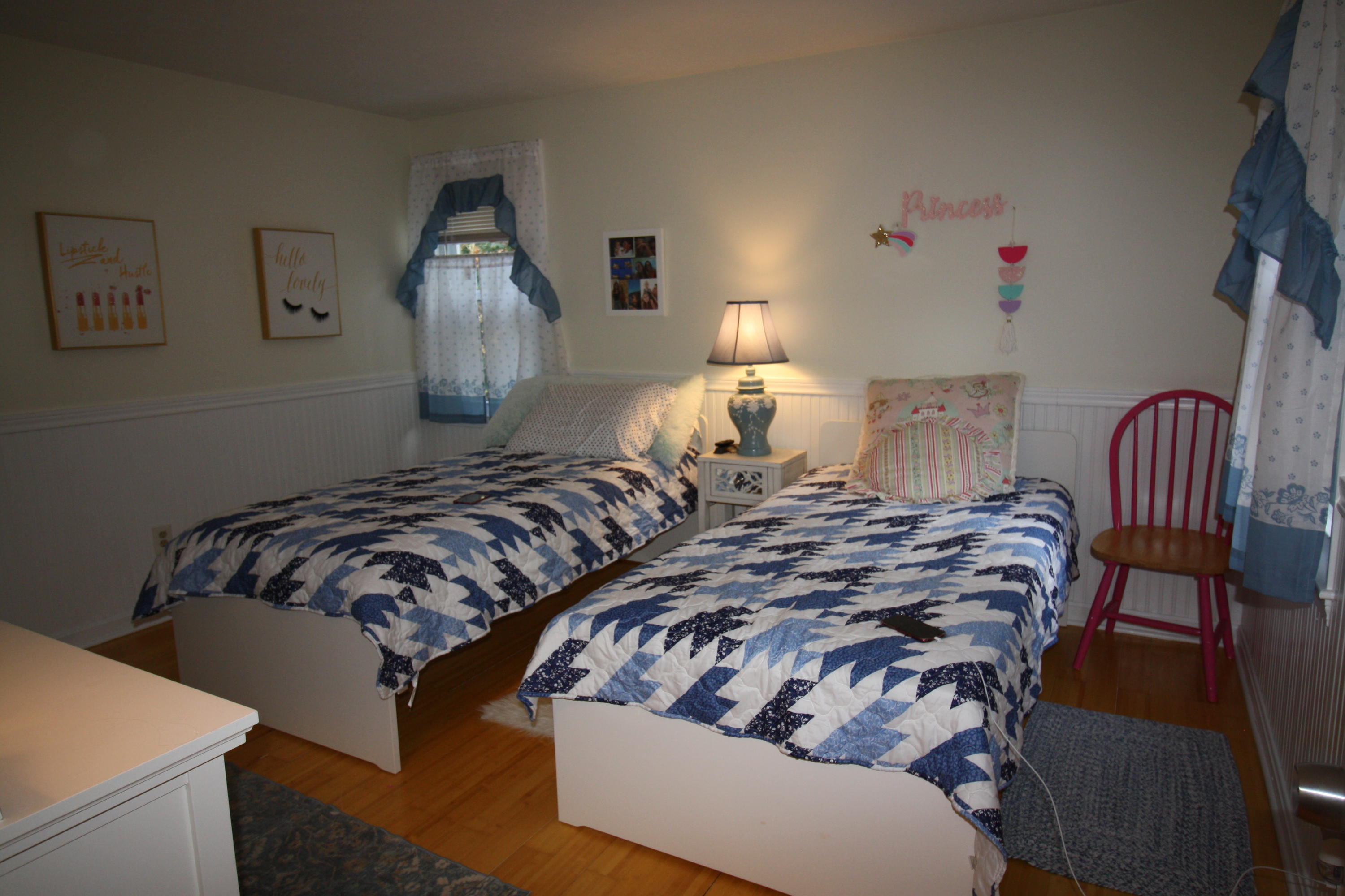 206 Nye Road Centerville, MA 02632 - Photo 8 of 14 a bed sitting in a bedroom next to a lamp