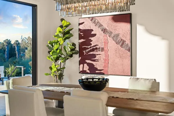 a living room with furniture a window and a fireplace