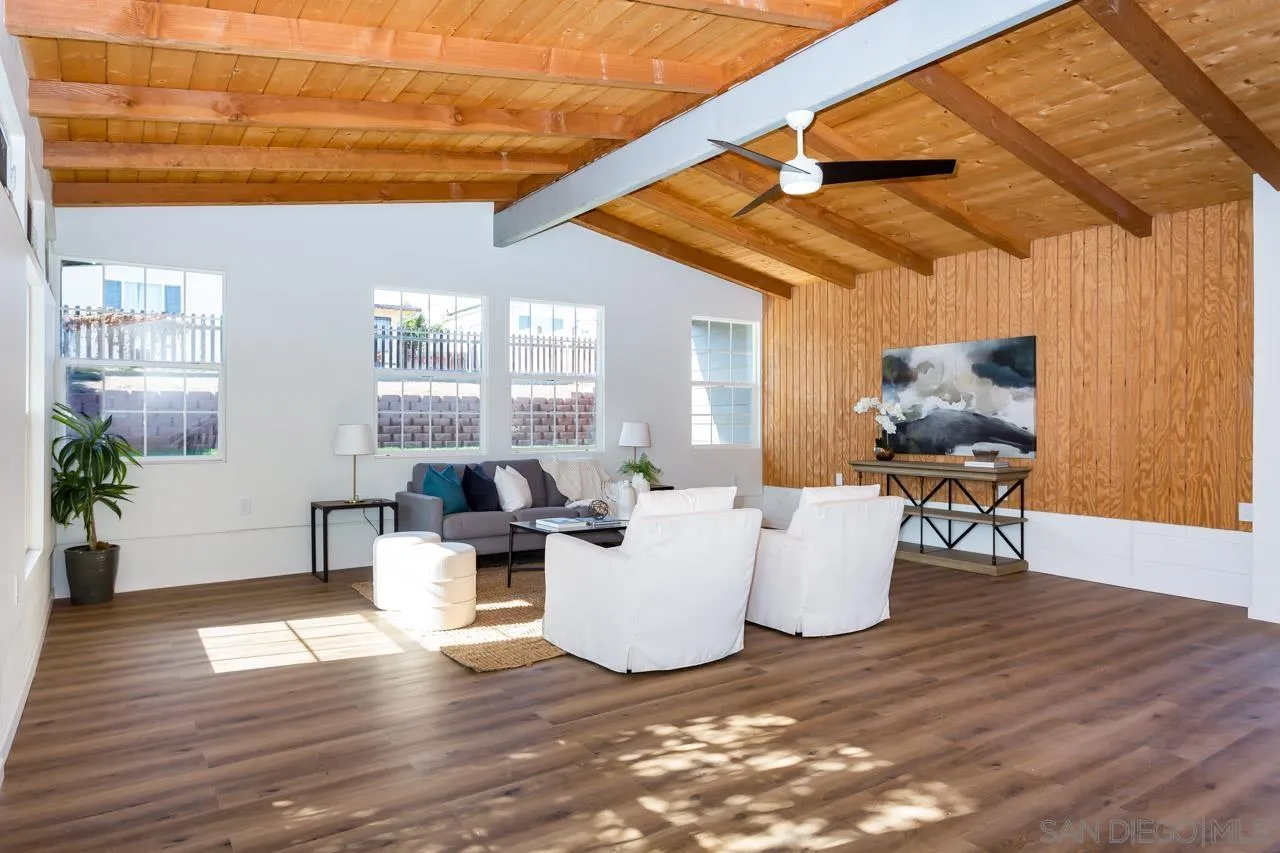 2610 Glebe Road Lemon Grove, CA 91945 - Photo 16 of 31 a living room with furniture and a wooden floor